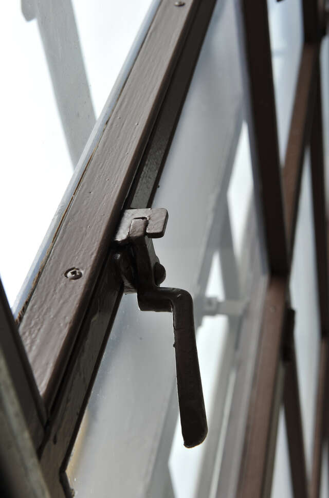 A close-up photo of the window frame detailing.